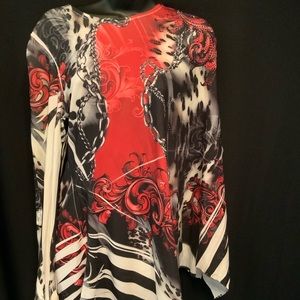 Multicolor top. Long sleeve and silky